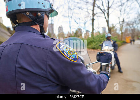 NEW YORK - CIRCA MARCH, 2016: NYPD sleeve patch shield on a police officer patrol in Central Park. The New York City Police Department (NYPD or NYCPD) Stock Photo