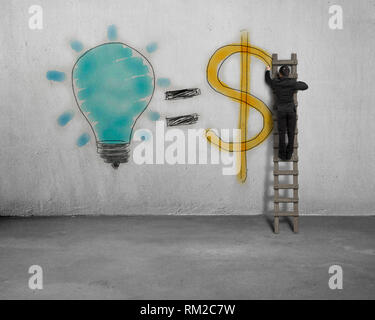 Drawing idea is money concept on wall Stock Photo