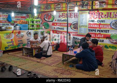 Open-air Street Side Restaurant (called Lesehan) By Night On Malioboro ...