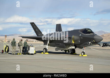 Crew chiefs with the 4th Aircraft Maintnenace Unit prepare to recover F35A Lightning II fighter jets during Red Flag 19-1, Nelllis Air Force Base, Nevada, Feb. 6, 2019. Pilots and maintainers from the 388th Fighter Wing's 4th Fighter Squadron and 4th Aircraft Maintenance Unit are participating in Red Flag 19-1 at Nellis AFB, Nevada. This is the wing's second Red Flag with the F-35A, America's most advanced multi-role fighter, which brings game-changing stealth, lethality and interoperability to the modern battlefield. Red Flag is the Air Force's premier combat exercise and includes units from  Stock Photo