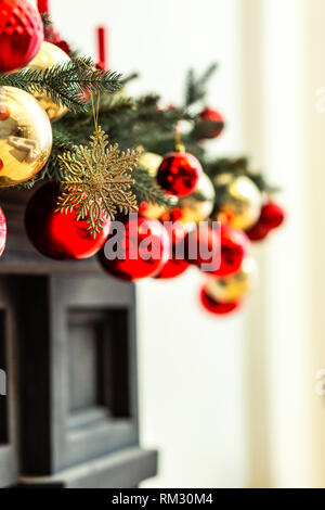 Beautiful red and golden christmas ornaments looking wonderful on the christmas tree Stock Photo