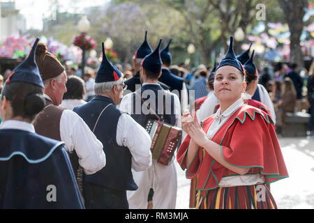 a traditonal madeira folklore music group s at the Festa da Flor or Spring Flower Festival in the city of Funchal on the Island of Madeira in the Atla Stock Photo