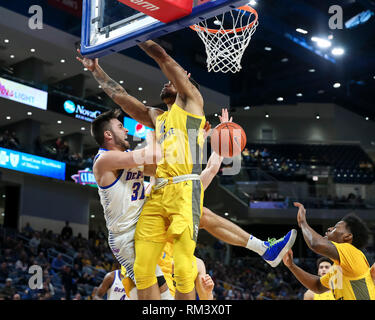 Chicago, USA. 12th Feb 2019. DePaul Blue Demons guard Max Strus (31) is fouled hard underneath the basket during NCAA basketball game between the Marquette Golden Eagles and the DePaul University Blue Demons at Wintrust Arena in Chicago IL. Gary E. Duncan Sr/CSM Credit: Cal Sport Media/Alamy Live News Stock Photo