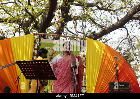 Dhaka, Bangladesh. 13th Feb, 2019. Kazi Krishnokoli Islam performs a song in Basanta Utsab (Spring Festival) in the Dhaka University campus. Credit: MD Mehedi Hasan/ZUMA Wire/Alamy Live News Stock Photo