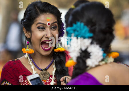 Dhaka, Bangladesh. 13th Feb, 2019. FEBRUARY 13 : Bangladeshi people celebrate the Pahela Falgun (First day of the spring) at the Dhaka University campus in Dhaka, Bangladesh on February 13, 2019.Hundreds of people joined in the cultural festival to welcome the first day of 'Boshanta, known as the symbol of life and begins with the first day of the Bengali month of Phalgun. Credit: Zakir Hossain Chowdhury/ZUMA Wire/Alamy Live News Stock Photo