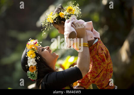 Dhaka, Bangladesh. 13th Feb, 2019. FEBRUARY 13 : Bangladeshi people celebrate the Pahela Falgun (First day of the spring) at the Dhaka University campus in Dhaka, Bangladesh on February 13, 2019.Hundreds of people joined in the cultural festival to welcome the first day of 'Boshanta, known as the symbol of life and begins with the first day of the Bengali month of Phalgun. Credit: Zakir Hossain Chowdhury/ZUMA Wire/Alamy Live News Stock Photo