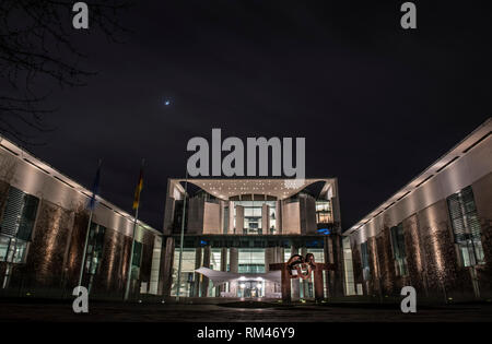Berlin, Germany. 12th Feb, 2019. The Federal Chancellery is lit up in the evening. Credit: Paul Zinken/dpa/Alamy Live News Stock Photo