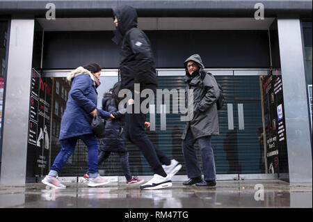 February 8, 2019 - London, United Kingdom - People seen walking past the recently-closed flagship branch of music and video retailer HMV on Oxford Street in central London. .February 15 sees the release of the first monthly retail sales figures of the year (for January) from the UK's Office for National Statistics. December figures revealed a 0.9 percent fall in sales from the month before, which saw a 1.4 percent rise widely attributed to the impact of 'Black Friday' deals encouraging earlier Christmas shopping. More generally, with a potential no-deal departure from the EU growing nearer and Stock Photo