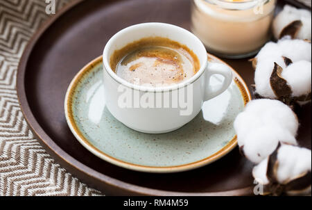 Cup of espresso coffee still life, coffee cup in wooden tray Stock Photo