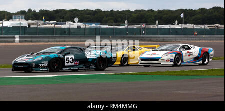 A special celebration and a record-breaking track parade, at the 2017 Silverstone Classic,  to mark the 25th anniversary of the Jaguar XJ220, Stock Photo