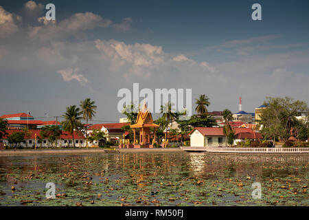 Cambodia, Kampot Province, Kampot, Lotus Pond, urban park and garden, shrine reflected in lake Stock Photo