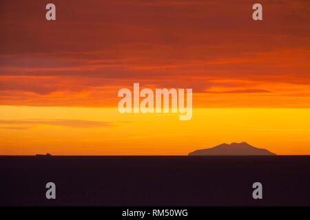 Sunset with Montecristo island from Castiglione della Pescaia, province of Grosseto, Tuscany, Italy, Europe Stock Photo