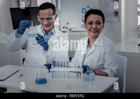 Young scientists conducting research in the laboratory Stock Photo