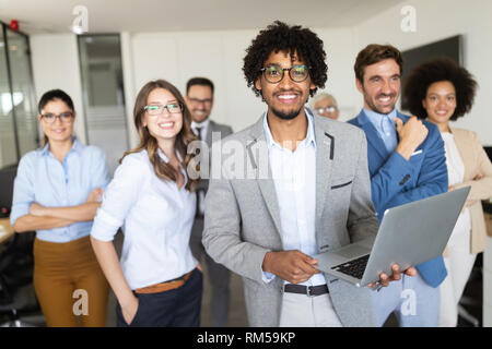 Programmer working in a software developing company office. Staff portrait Stock Photo