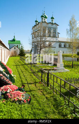 Veliky Novgorod, Russia - May 6, 2018. Necropolis of St Nicholas Vyazhischsky stauropegic monastery and St John the Evangelist church in Veliky Novgor Stock Photo