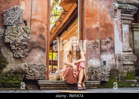 Young woman traveler in Ubud palace, Bali - Inside the Ubud palace, Bali, Indonesia Stock Photo