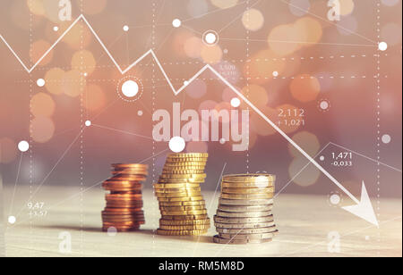 Abstract Stock Business Charts of Graph Arrow Down with Coins and Blurred Background Stock Photo