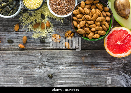 Healthy food on table. Bowls with fresh ingredients for breakfast. Vegetarian diet concept. Stock Photo