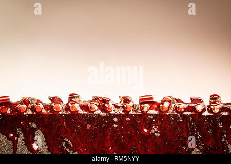 blood on classic chainsaw,detail. Stock Photo