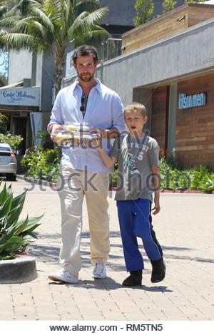 Tracy Warbin and daughter Auden Wyle Noah Wyle and family arriving at