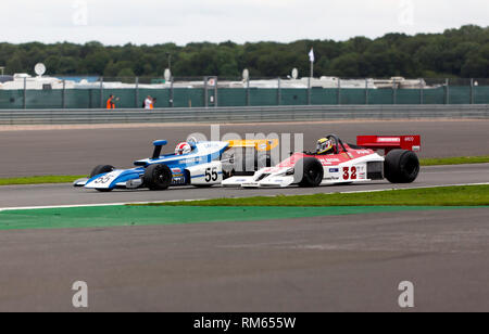 David Shaw in a March 721 battles with Philip Hall's Theodore TR1, during the FIA Masters Historic Formula One Race at the 2017 Silverstone Classic Stock Photo