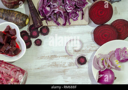 Fresh raw vegetables (onion,cabbage,carrots,beet,) on white wooden background. Bio Healthy food concept.Top view Stock Photo