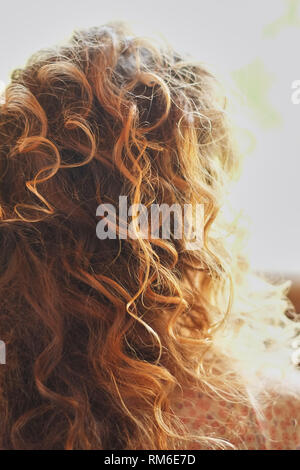 Woman curly natural hair background closeup Stock Photo