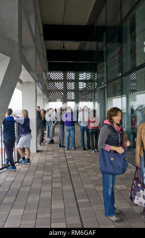 Visitors to the 10th floor viewing platform at the Switch House Extension, Tate Modern, South Bank, London, UK Stock Photo