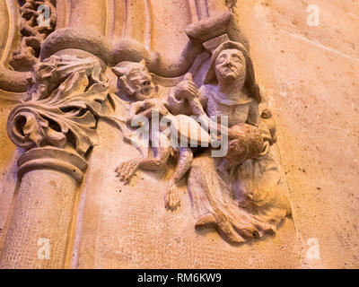 ornaments and sculptures of the Gothic period on the gates of a church in Valencia Stock Photo