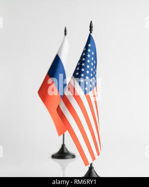 The flags of the USA and Russia on a white background isolated. The concept of policy Stock Photo