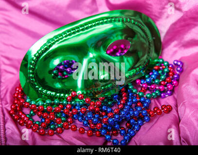 Mardi Gras masks with colorful beads Stock Photo