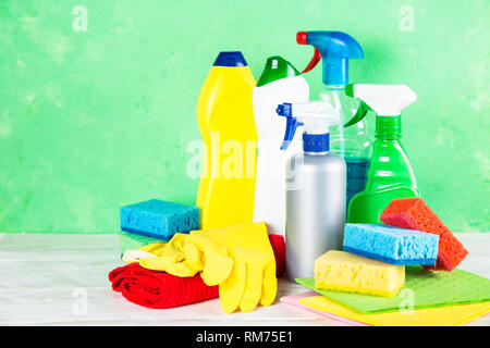 Cleaning product, household on green background. Stock Photo