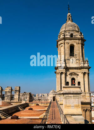 Unusual domed brick roof and clock bell tower, Cathedral Basilica, Malaga, Andalusia, Spain Stock Photo