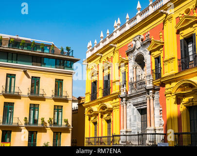 Colourful grand Episcopal Palace or Bishop's Palace, Plaza del Obispo, Malaga, Andalusia, Spain Stock Photo