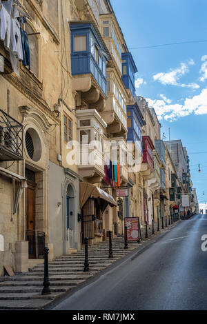 Traditional enclosed wooden balconies in Valletta Malta Stock Photo