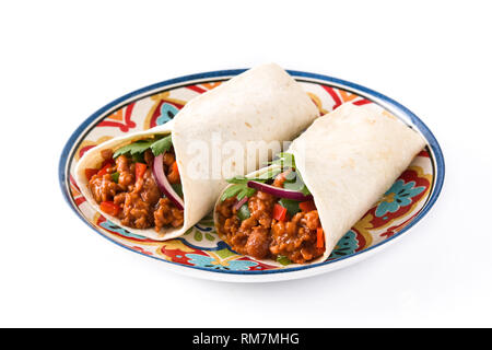 Typical Mexican burritos wraps with beef, frijoles and vegetables isolated on white background. Stock Photo