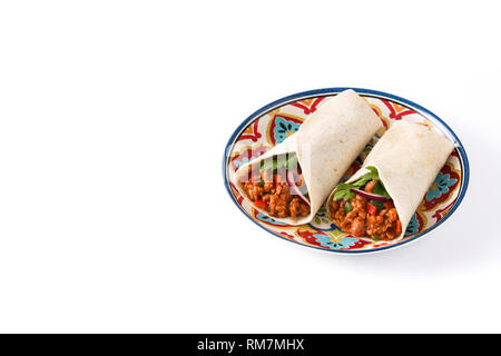 Typical Mexican burritos wraps with beef, frijoles and vegetables isolated on white background. Copyspace Stock Photo