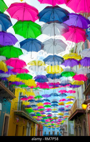 Umbrella Street is seen in San Juan, Puerto Rico above Fortaleza Street ...