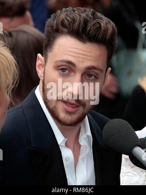 London, UK, 11th May 2014 Aaron Taylor Johnson arrives at the European Premiere of 'Godzilla' at Odeon Leicester Square in London, England Stock Photo