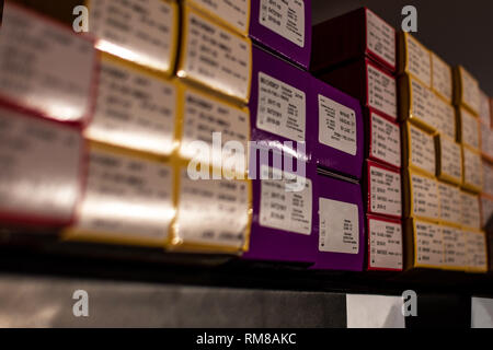 Rows of shelves with goods boxes in modern industry warehouse store at factory warehouse storage Stock Photo