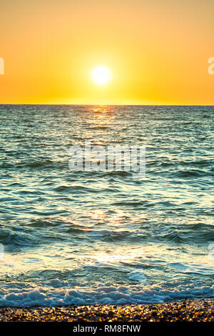sea landscape with a sunset. evening surf ocean. beautiful scenery with sunrise over sea panoramic view Stock Photo