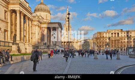 LONDON THE NATIONAL GALLERY AND ST MARTINS IN THE FIELD WITH PEOPLE Stock Photo