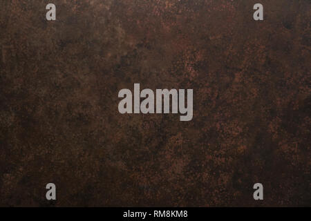 Brown red texture painted on canvas. Artist  primed cotton mottled grunge background. Stock Photo