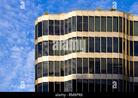 Modern building with curving facade. Stock Photo