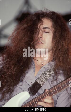 Badlands guitarist Jake E. Lee is shown soloing during s concert