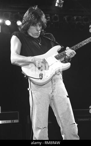 Guitarist Jeff Beck is shown performing on stage during a 'live' in concert appearance. Stock Photo