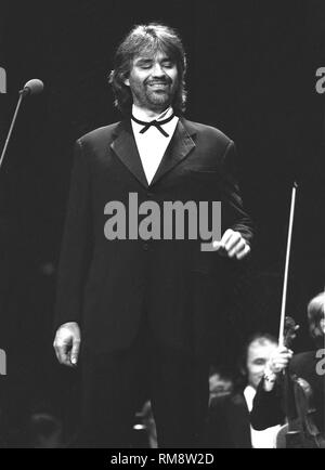 Italian operatic pop tenor and a classical crossover singer Andrea Bocelli is shown during a 'live' concert performance. Stock Photo