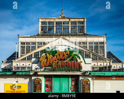 Great Yarmouth Winter Gardens on the seafront. Grade II listed. Built of glass and iron in Torquay and moved to Great Yarmouth in 1904. Endangered. Stock Photo