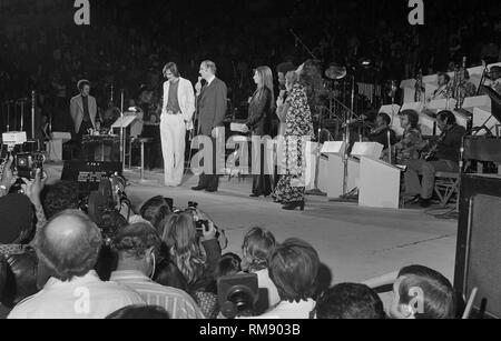 Presidential candidate George McGovern talks onstage before a fundraising concert in April 15, 1972 at The Forum in Los Angeles featuring James Taylor, Carole KIng, Barbra Streisand and Quincy Jones. Stock Photo