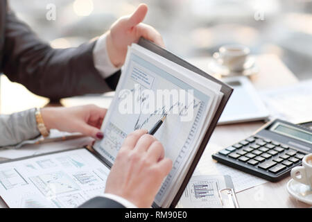 close up. colleagues discuss financial schedule. accounting Stock Photo